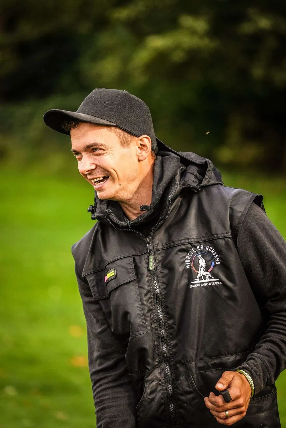 Miracle K9 Academy trainer Andrejus during an outdoor dog training session